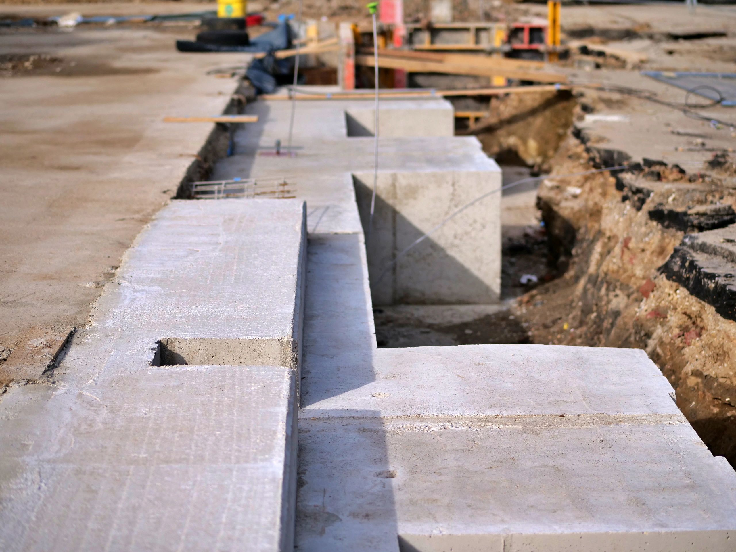 Concrete foundation work at a residential construction site